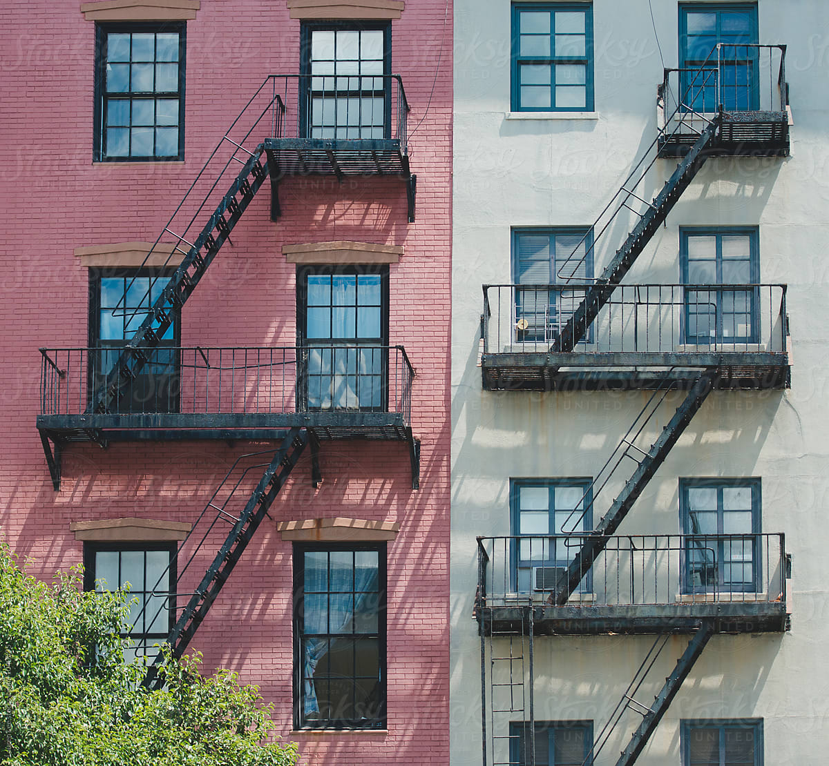 Apartment building and fire escapes in the city
