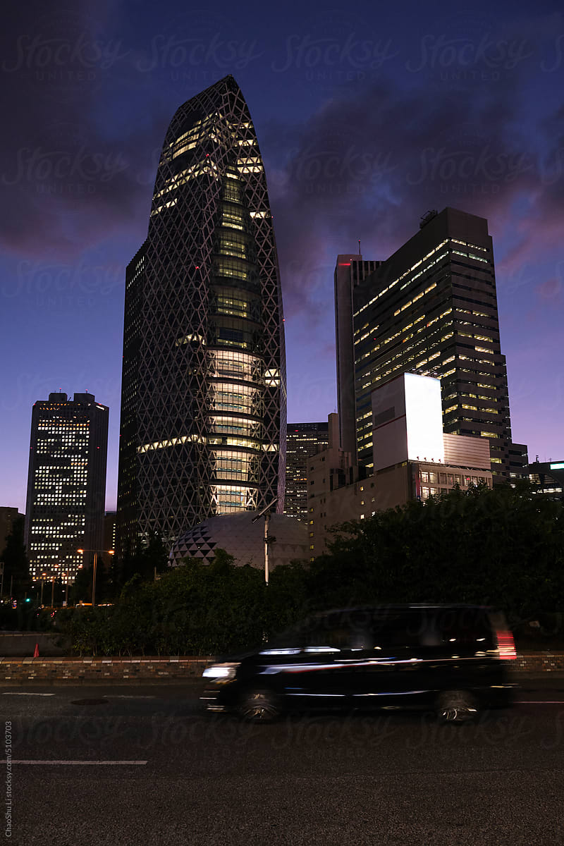City business district buildings,\
at dusk