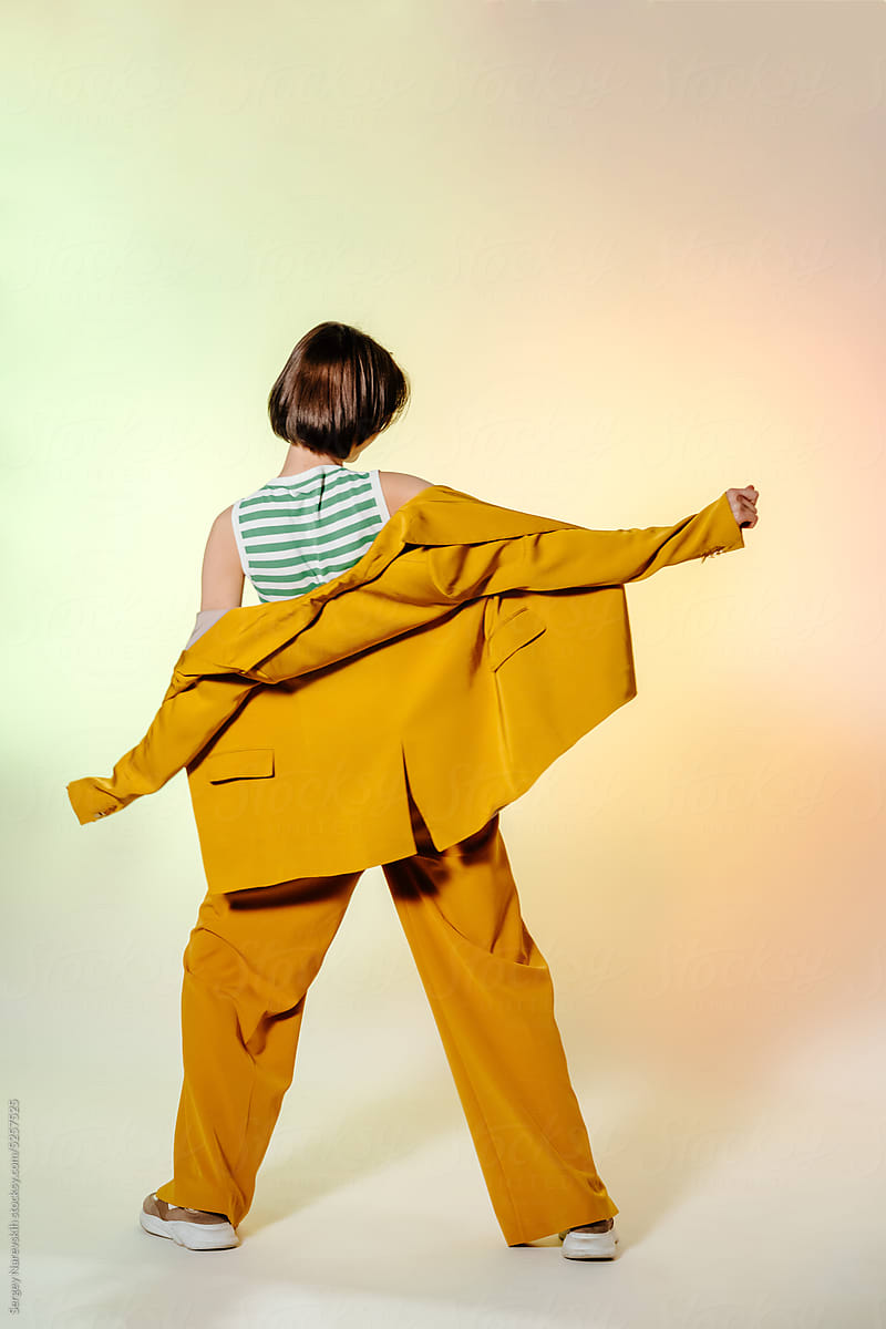 Unrecognizable woman in yellow outfit
