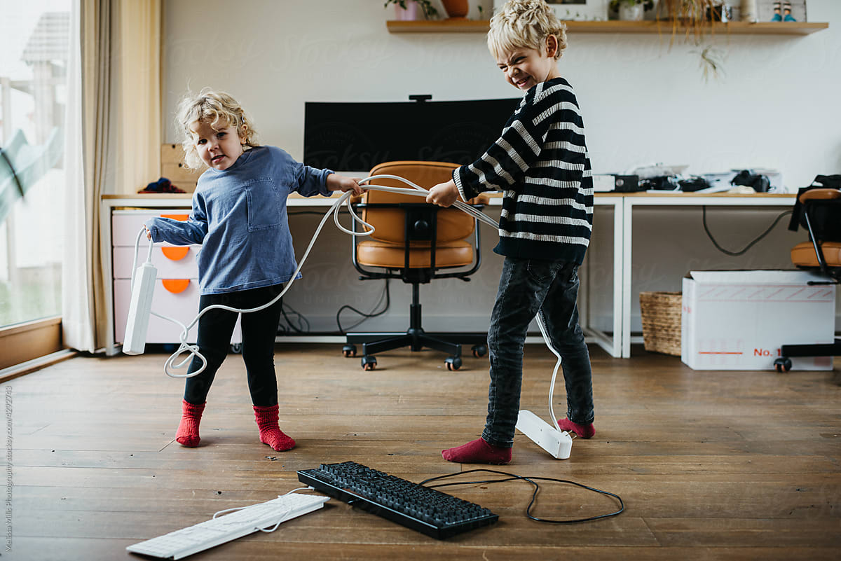 Kids playing with power cords and cables
