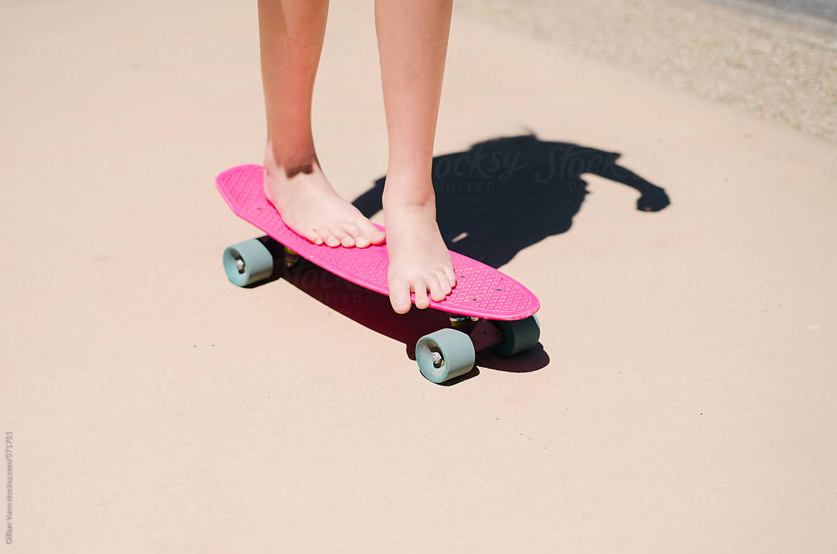 Girls Feet On A Pink Skateboard In The Sunshine By Gillian Vann 