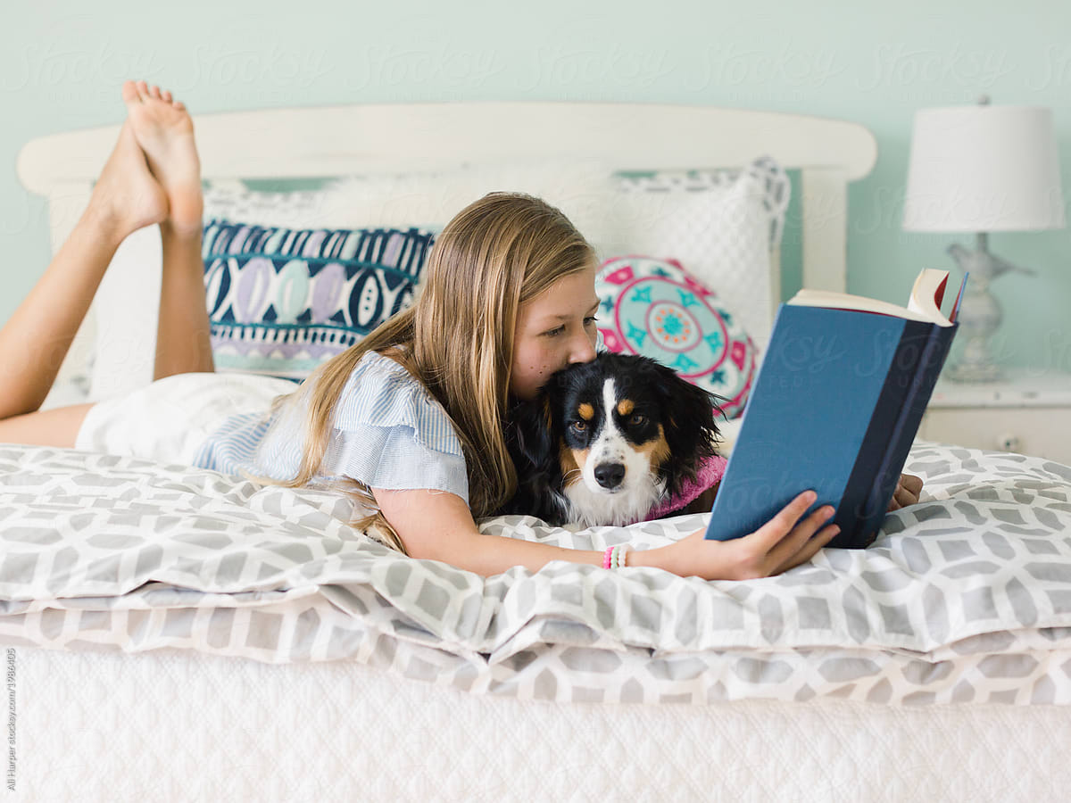 Young Girl Reading On Her Bed By Stocksy Contributor Ali Harper Stocksy 