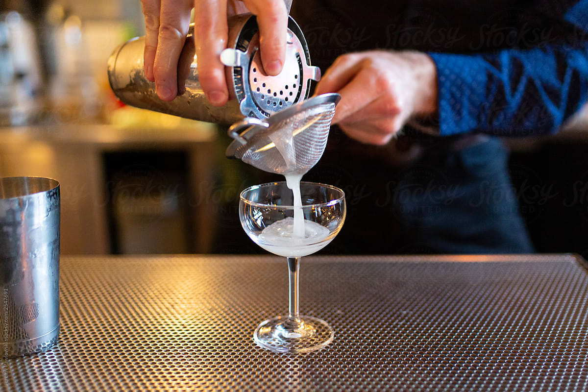 Bartender makes Cocktail on Bar