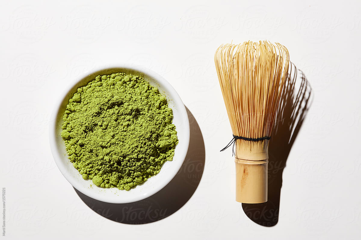 Bamboo Whisk And Bowl Of Matcha Powder. by Stocksy Contributor
