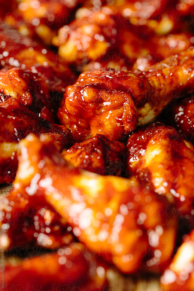 Detailed close up of cooked BBQ chicken wings