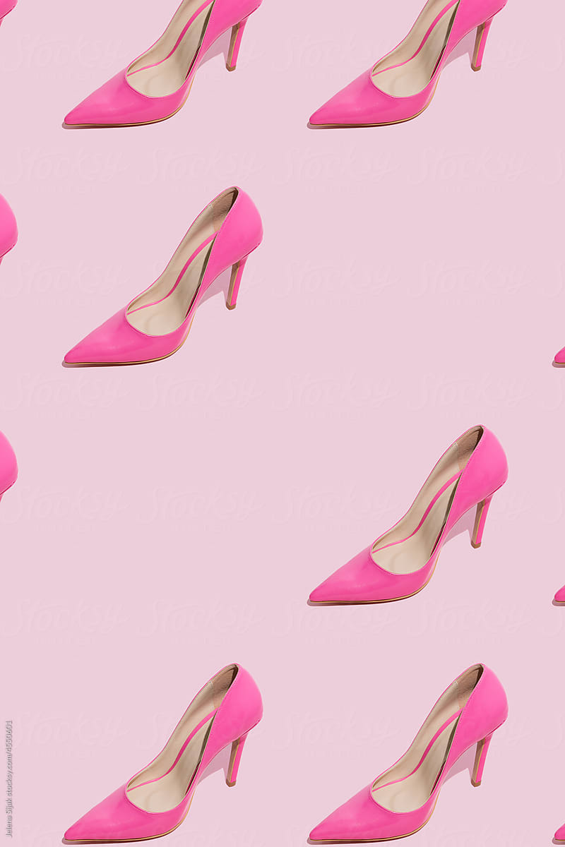 Angle view pattern made of pink high heel sandals with copyspace.