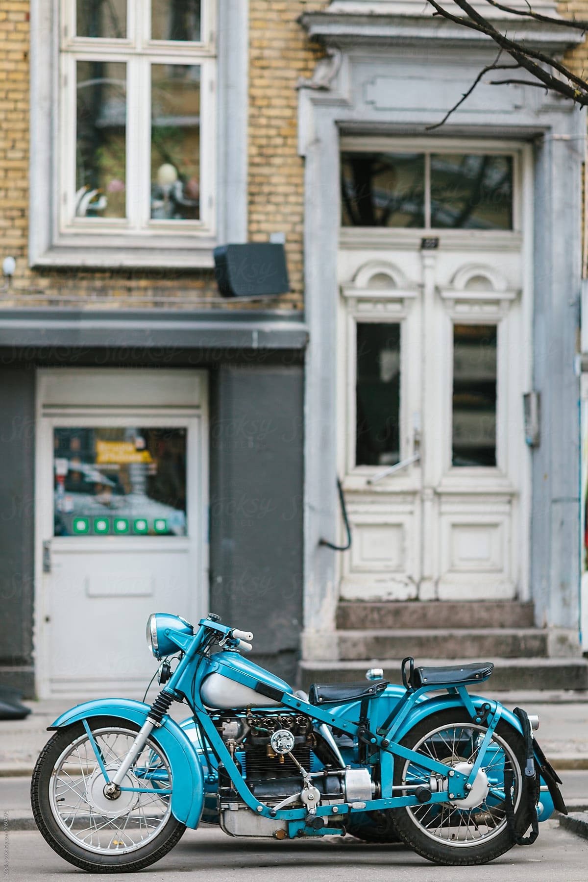 Vintage motorcycle on street.