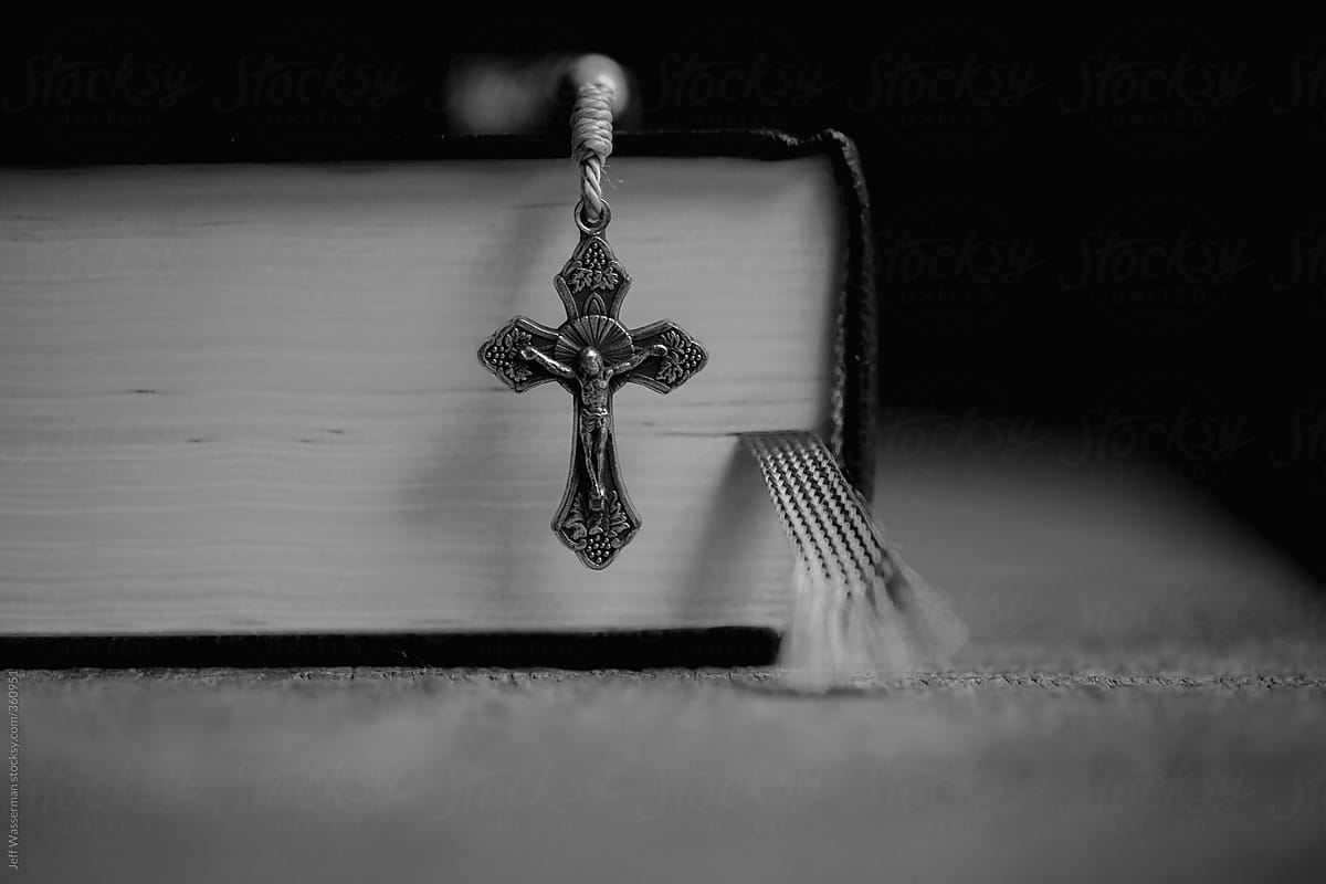 Rosary and Bible on Table