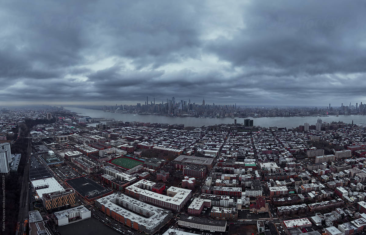 Manhattan before the storm. drone panorama with neighbourhood in front