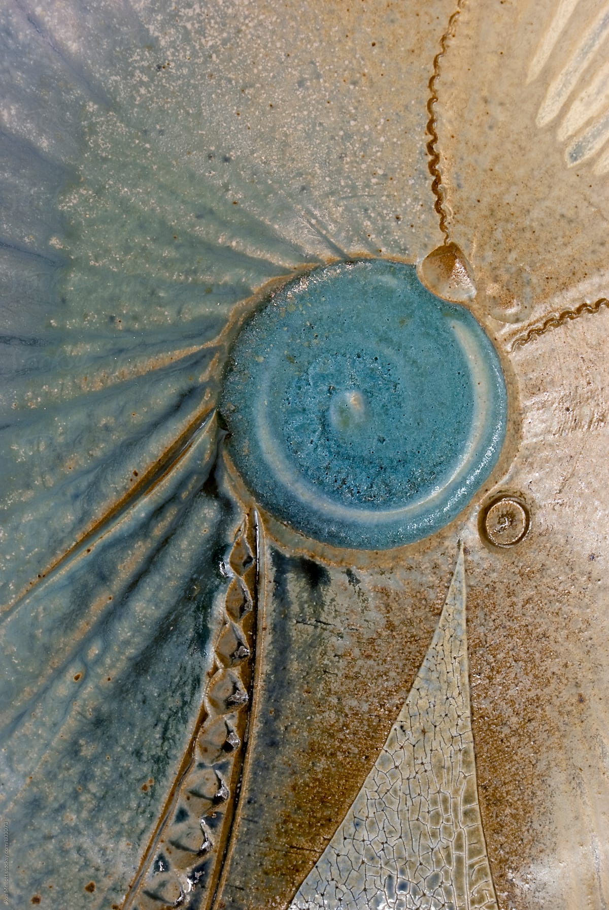 Closeup macrophotograph of piece of ceramic wall hanging