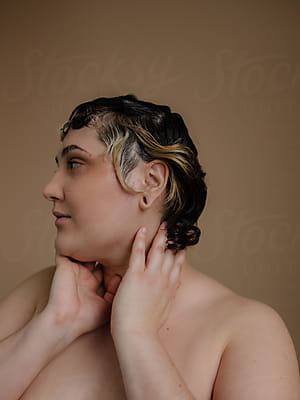 Young Plus Size Model Posing Naked In Studio by Stocksy Contributor Asya  Molochkova - Stocksy