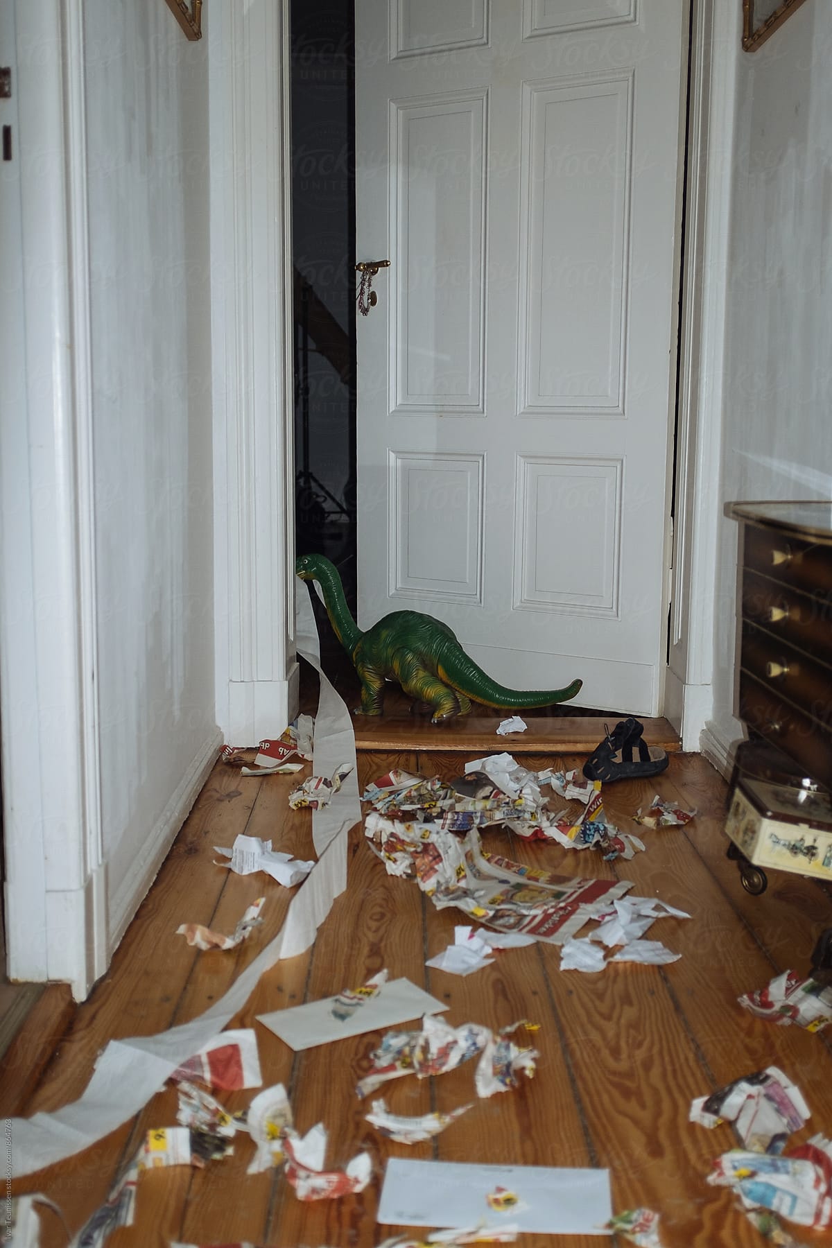 Rebellious dinosaur trashing up the hallway.