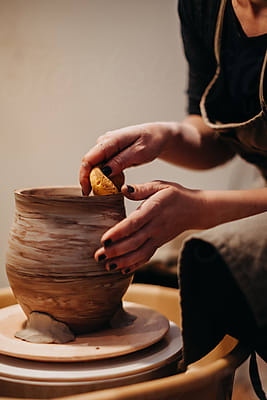 Piece On Clay On Potter Wheel by Stocksy Contributor Ezequiel
