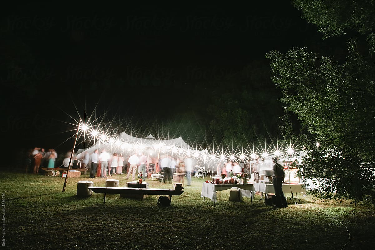 Outdoor wedding reception at night time