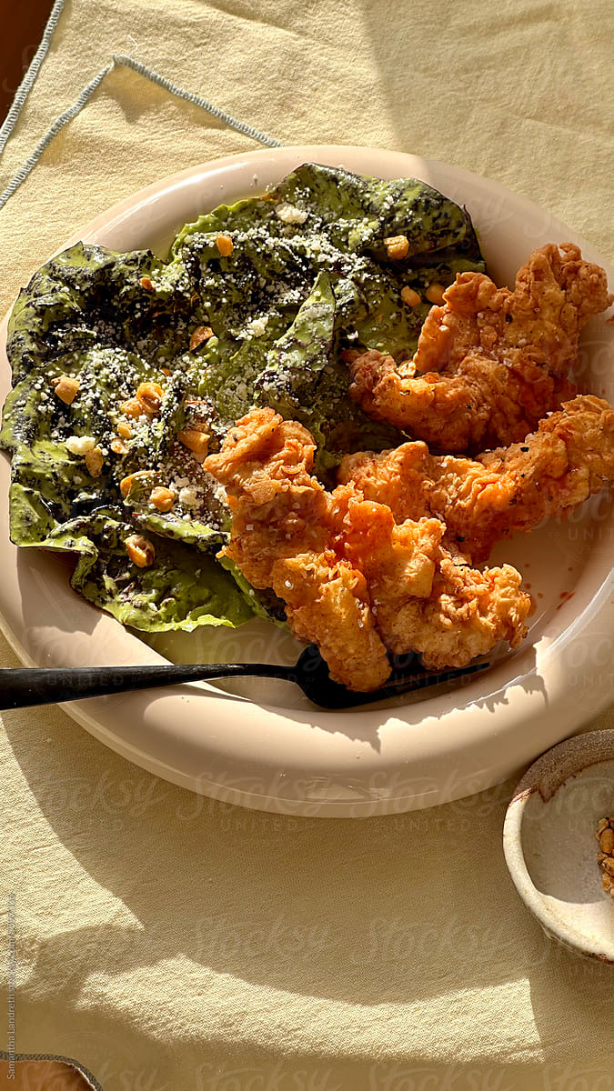 Fried Chicken and Salad in Golden Light
