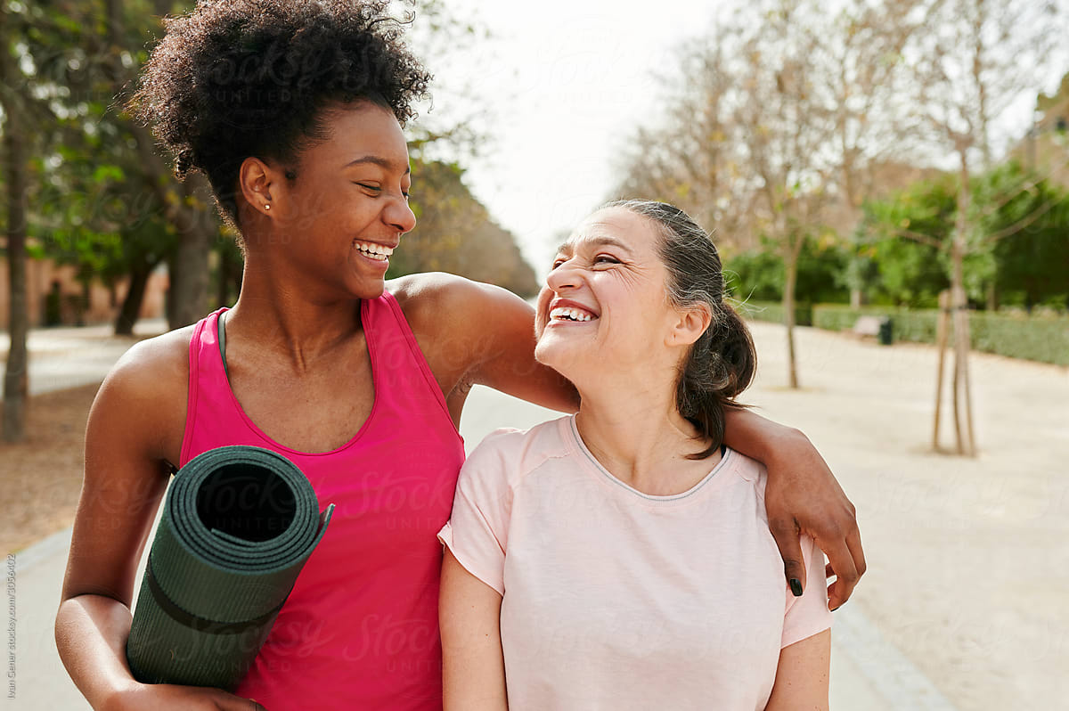 Friends laughing after an outdoor workout