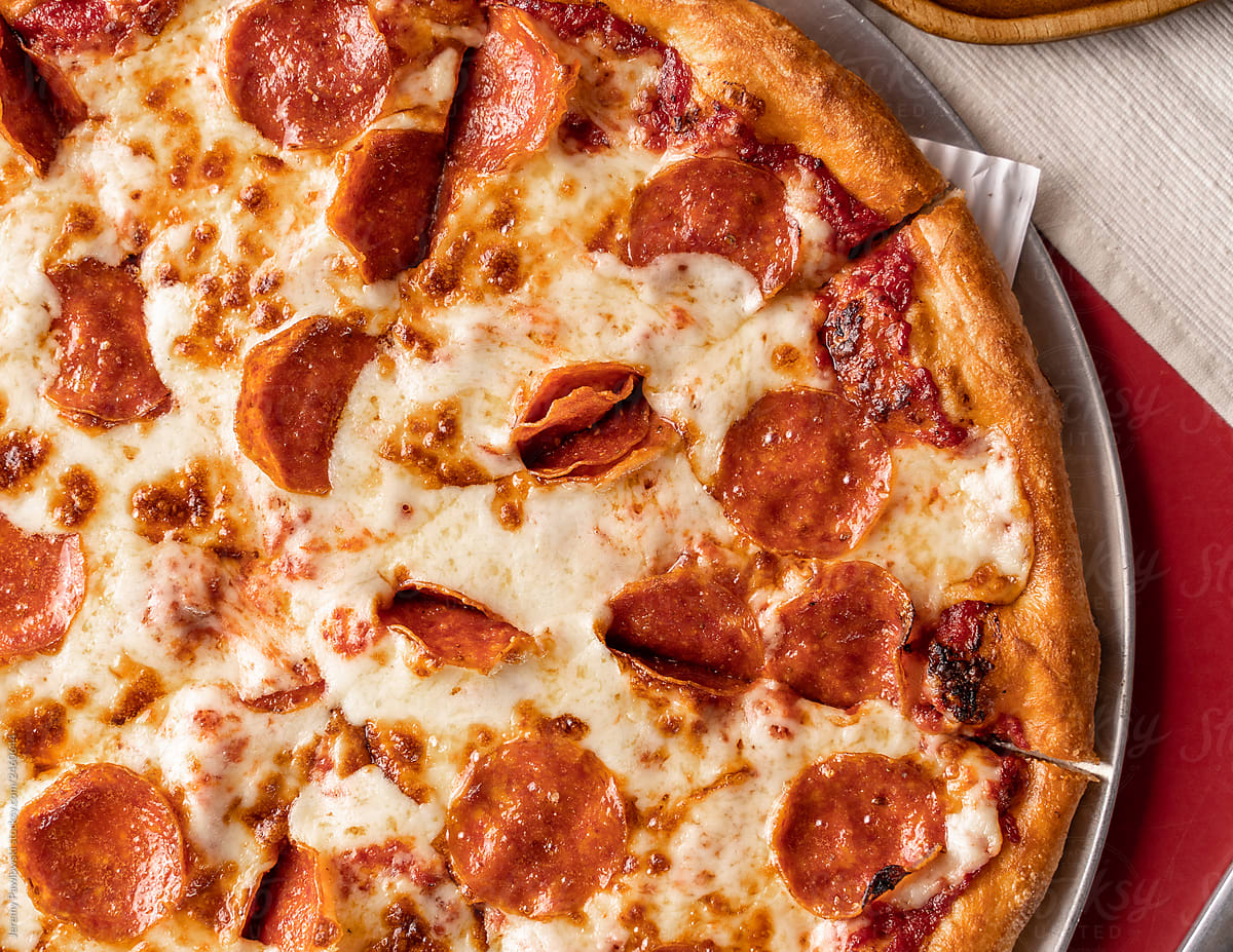 Open Pizza Box With Pepperoni by Stocksy Contributor Synchro Shoot -  Stocksy