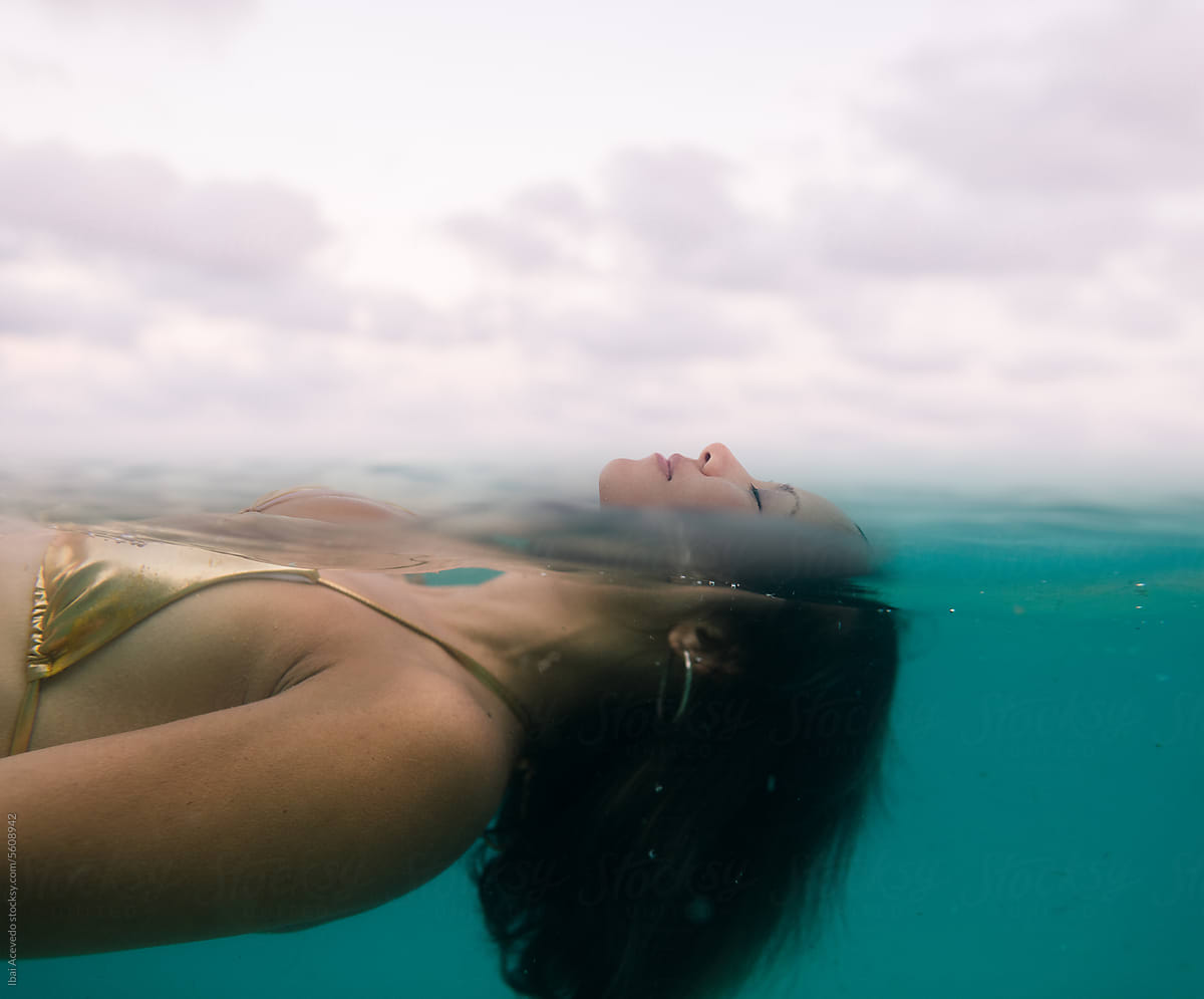 Relaxed woman floating in the sea