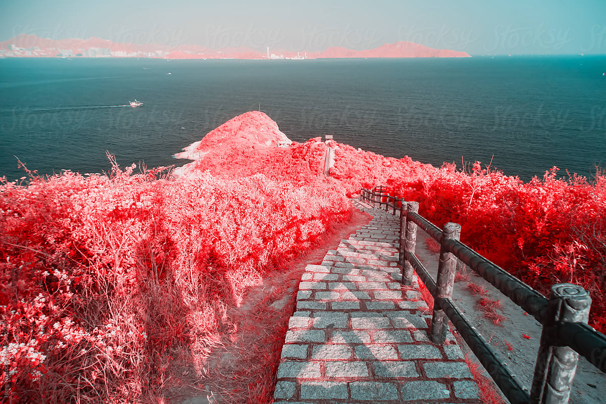 Infrared photography of sea and island and path