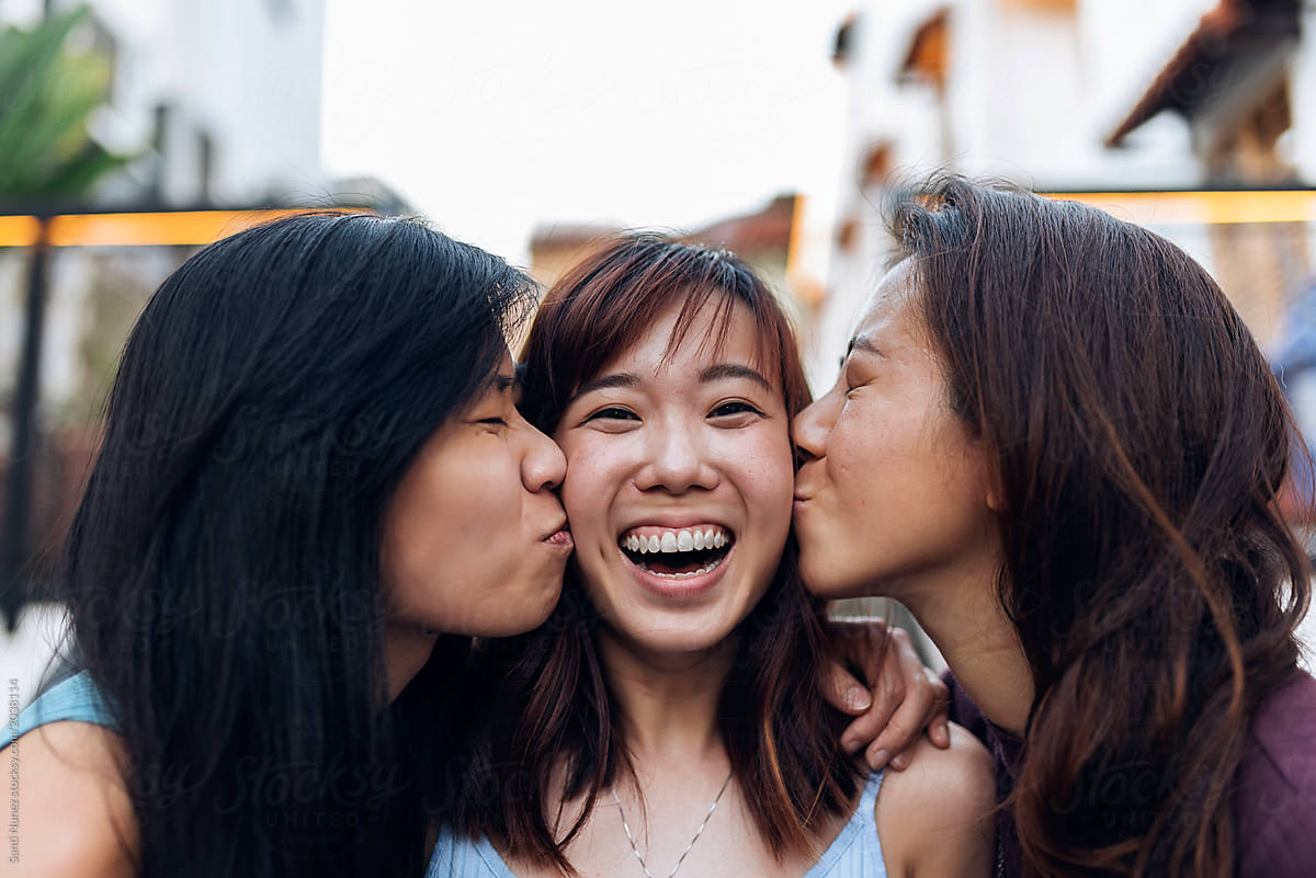 Asian Friends Women Having Fun In The Street By Santi Nuñez