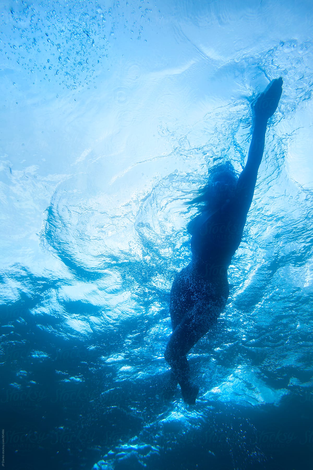 Female Athlete Swimming Underwater