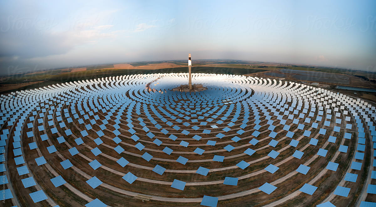 Solar power tower, mirrors, EU - green energy transition - aerial dusk