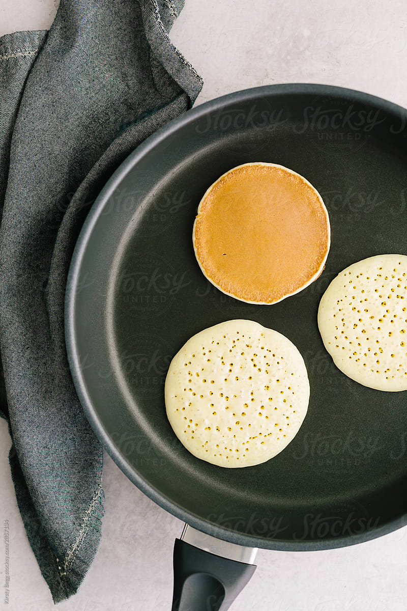 Pikelet drop scone scotch pancakes in pan with bubbles
