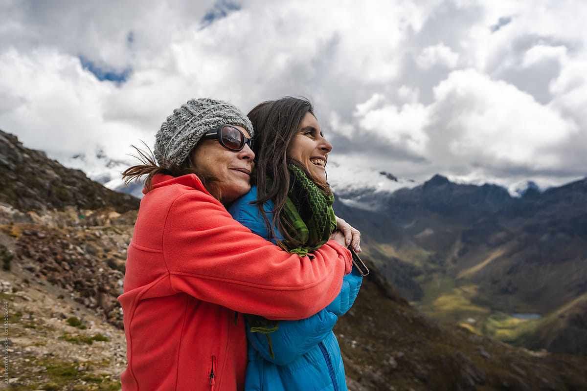 woman mother and daughter enjoying adventure in the mountains