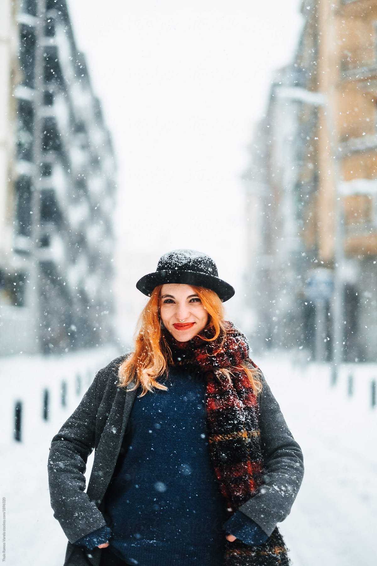 potrait of a woman in a snowy landscape  smiling
