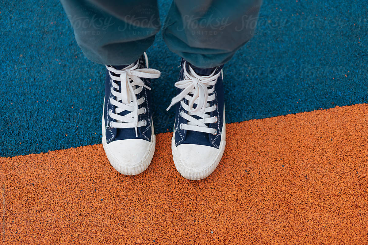 Sneakers, standing with your feet on the playground.