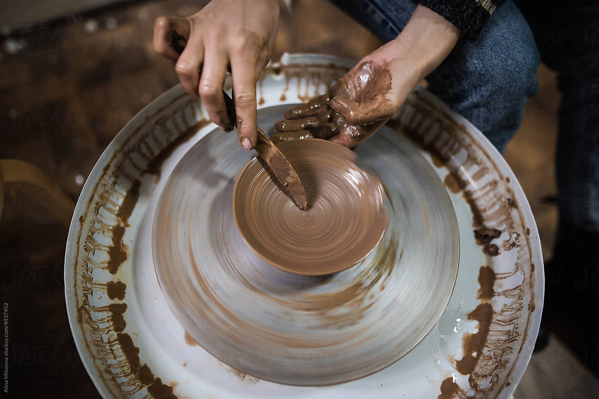 Crop Woman Working With Clay On Pottery Wheel