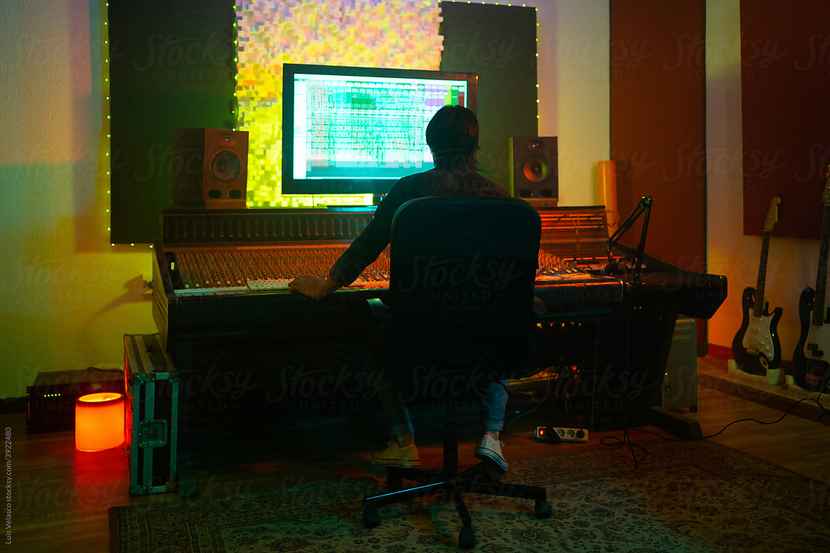 Professional Sound Engineer Working With A Mixer Sound Software.