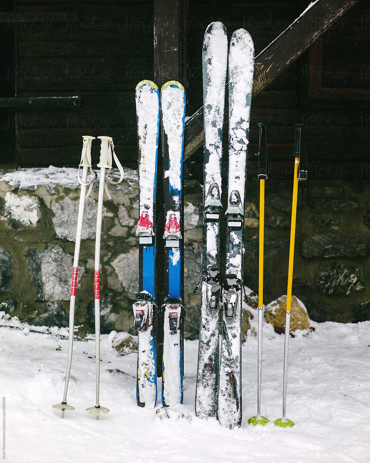 Two pairs of ski in snow