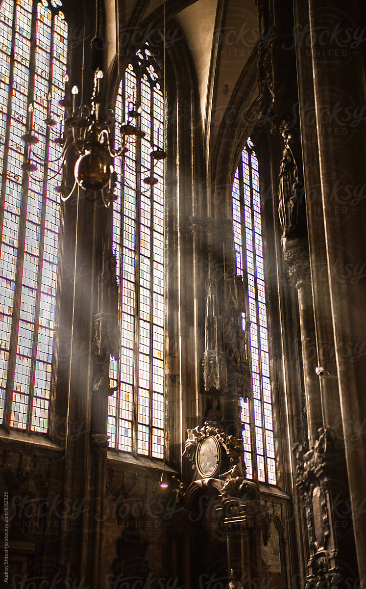 Beautiful sunlight illuminating the dreamy interior of St. Stephen's Cathedral in Vienna.
