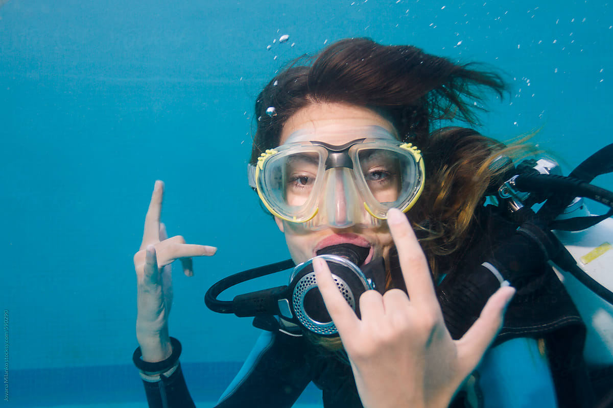 Portrait of Woman Scuba Diving in the Pool
