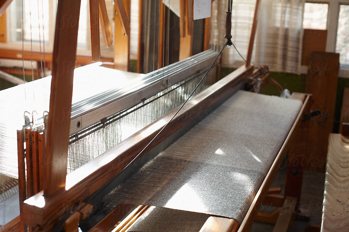 Close up of an artisanal loom with wool blanket in process.