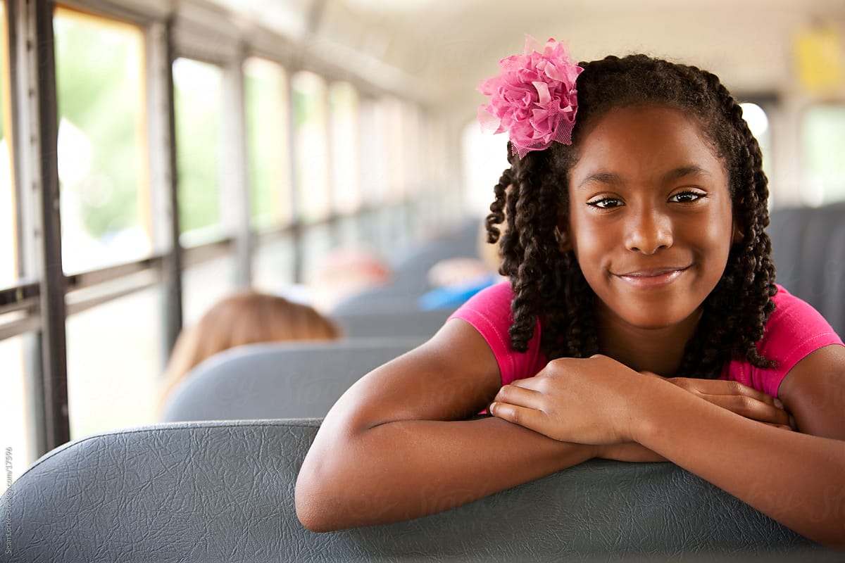 School Bus Cute African American Girl Looks Over Seat By Sean Locke 