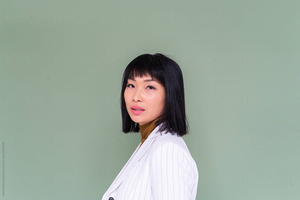 Studio Portrait Of Stylish Asian Woman