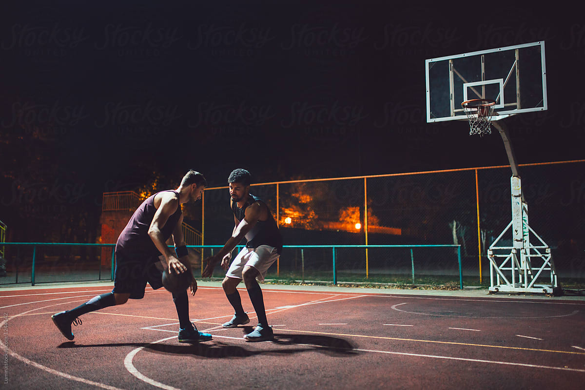 Sportsmen Playing Basketball