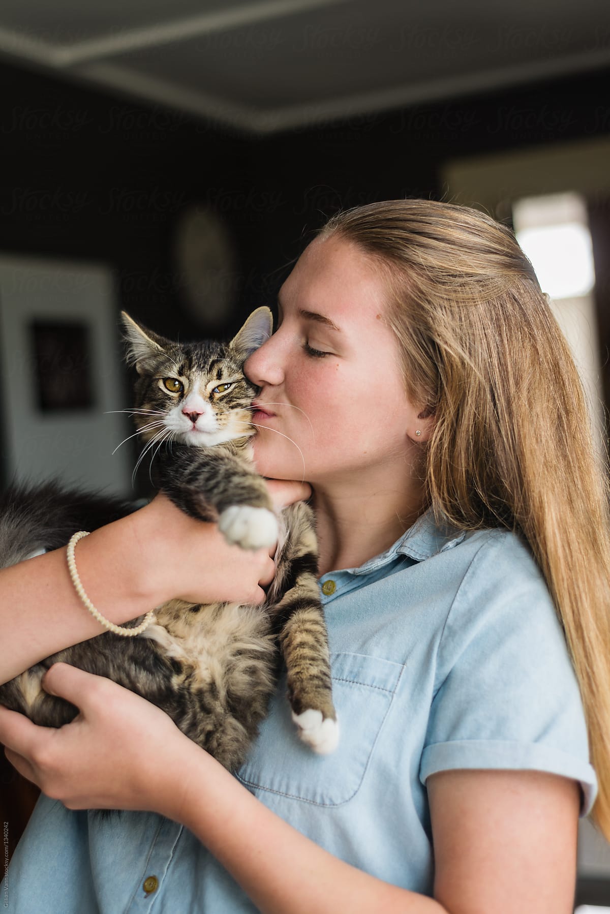 Teen Girl Holding Her Cat By Gillian Vann