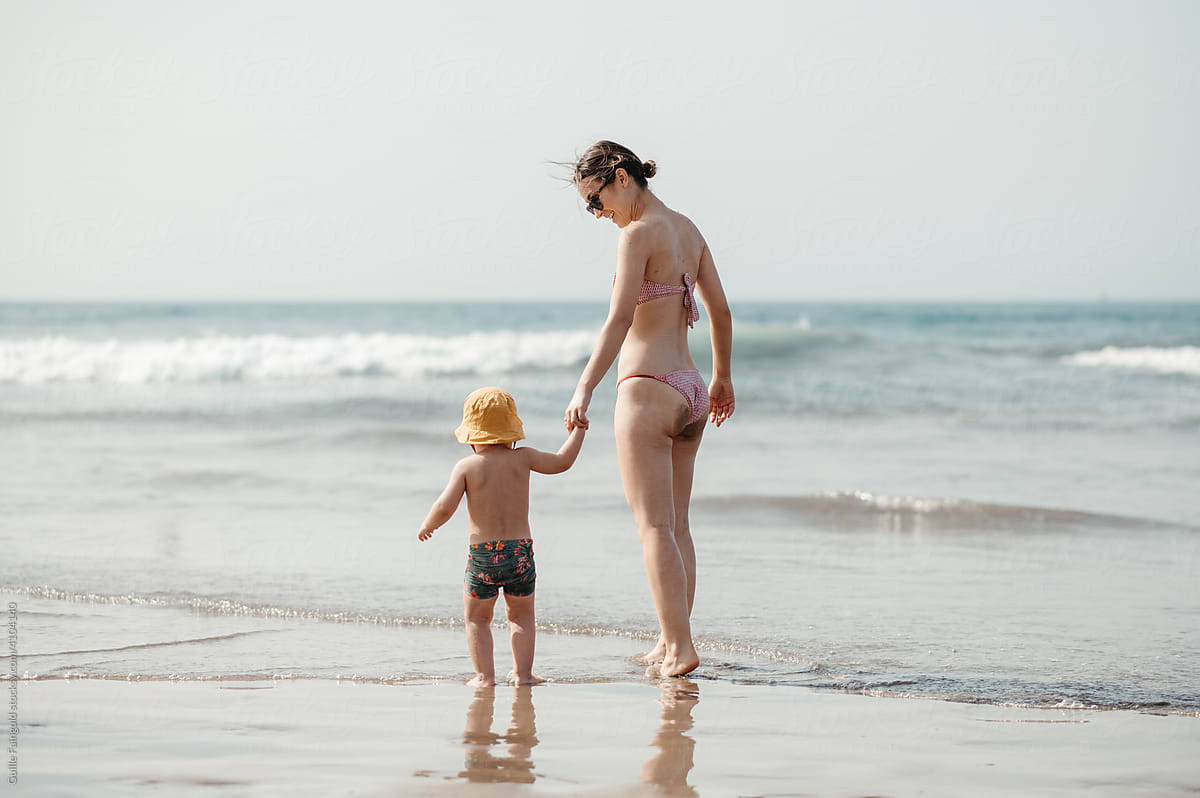 Mother with son on beach