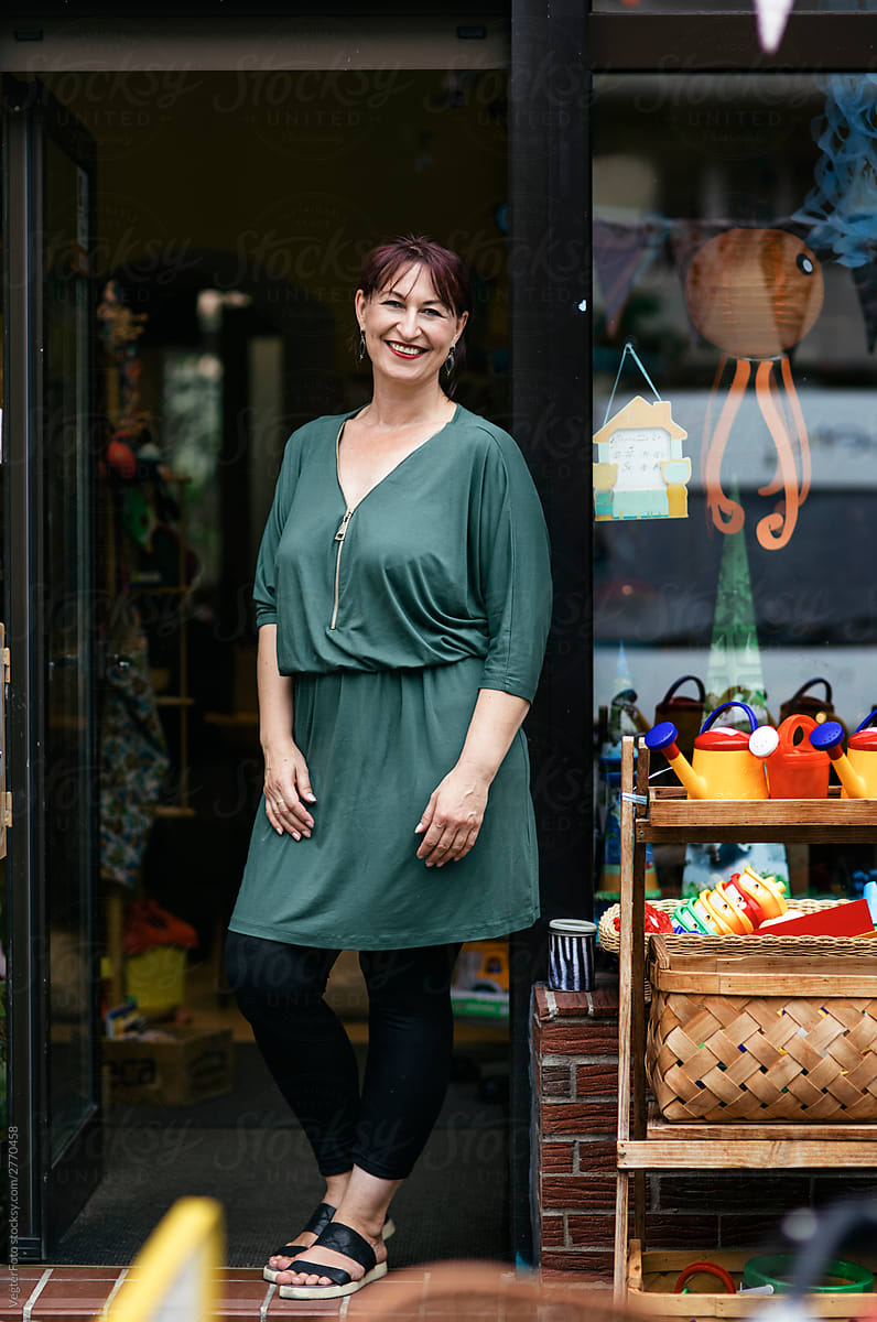 portrait of small business owner in shop front