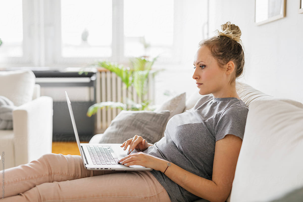 Woman Working On Her Laptop From Home