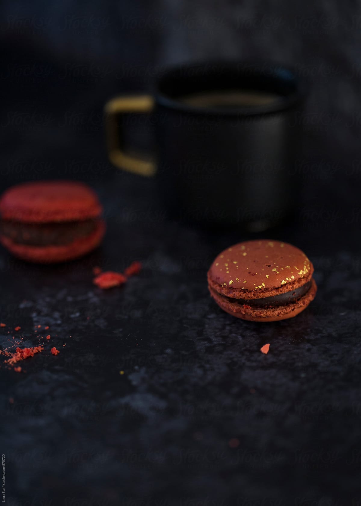 Colourful macaron biscuits and espresso coffee
