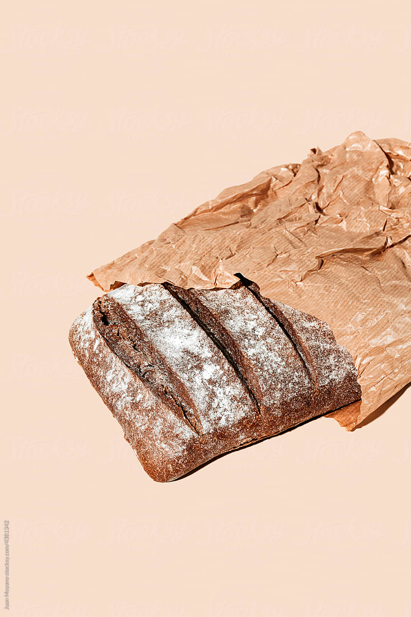 rye bread loaf in a brown paper bag