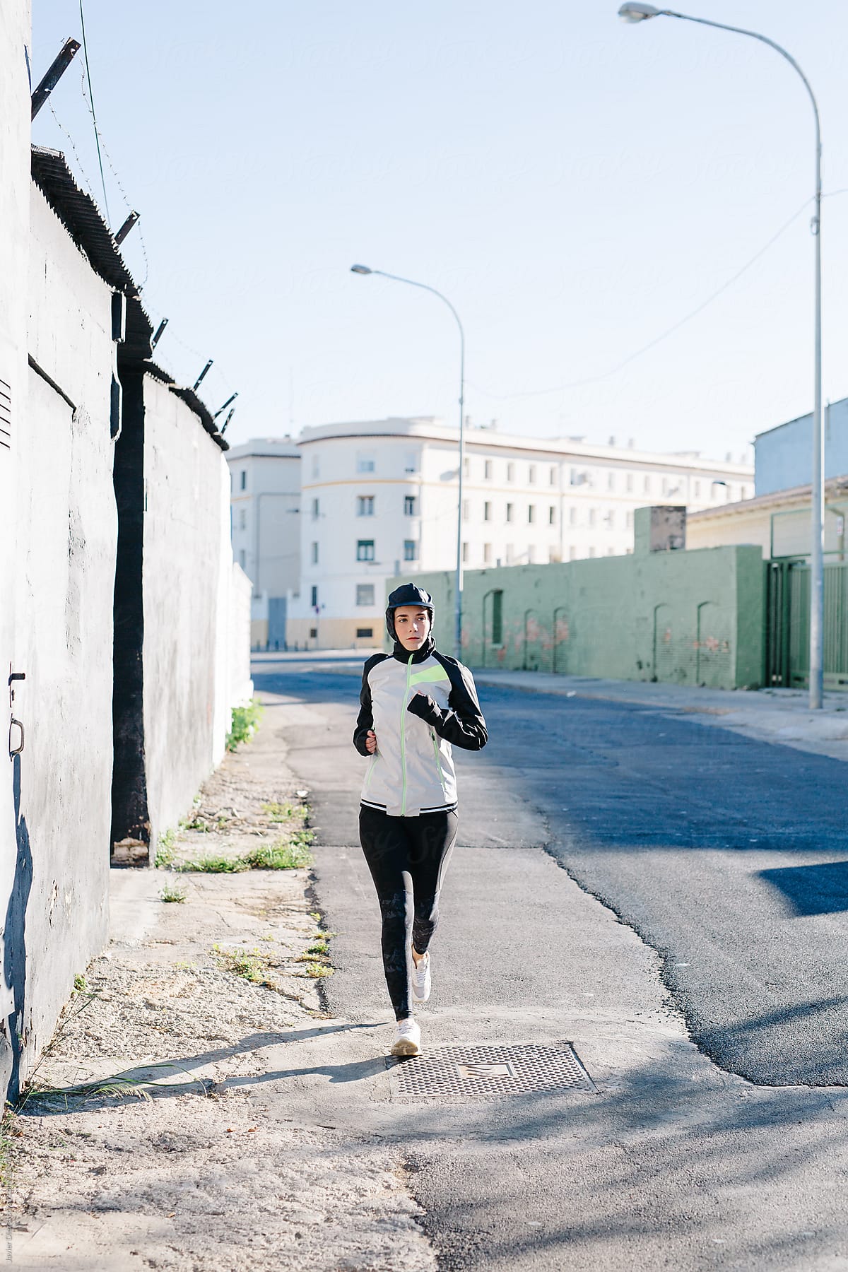 Woman running at street