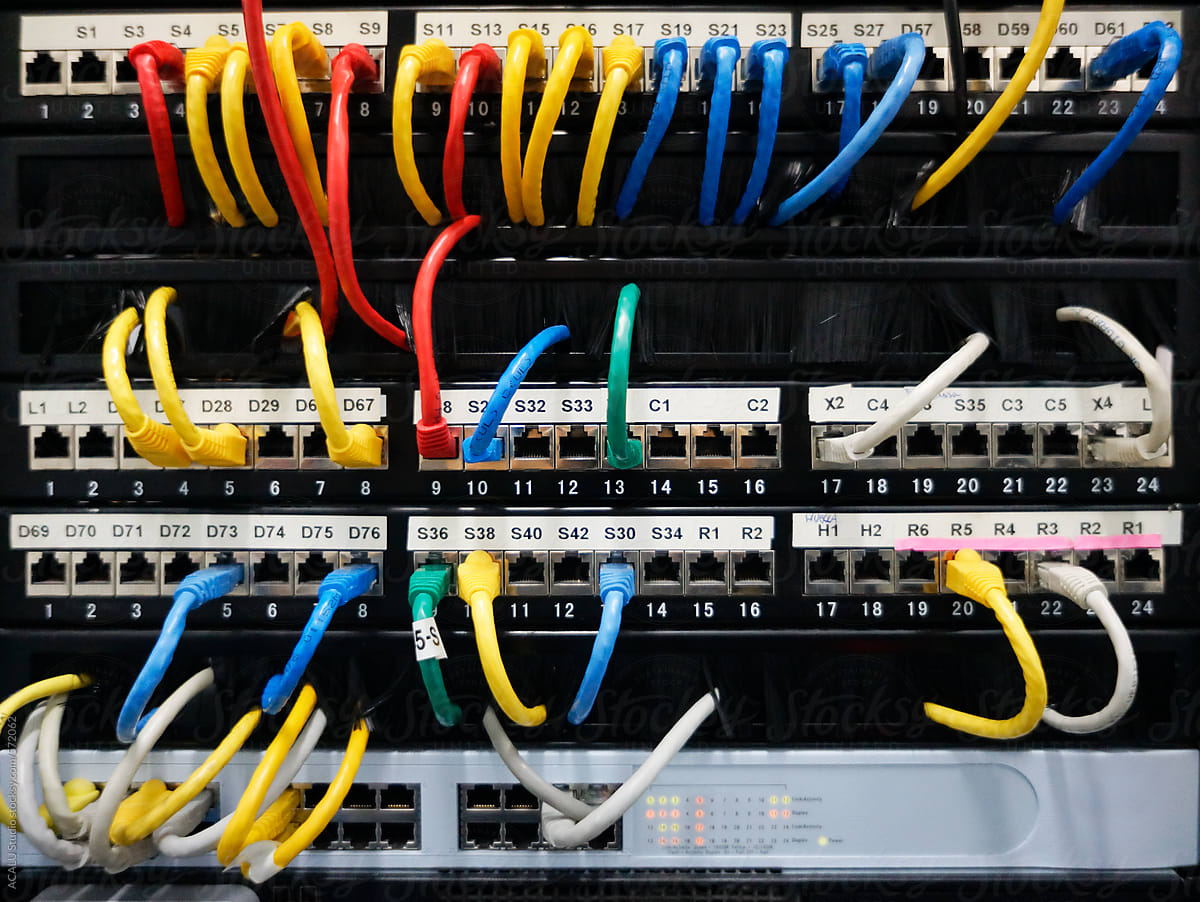 Colored network cables in a telecommunications rack