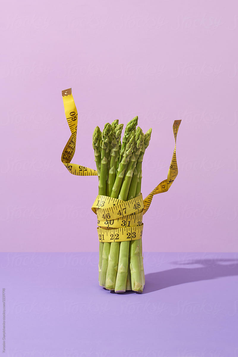 Asparagus banch with measuring tape.