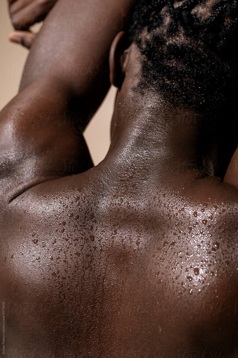 Wet back of a black man