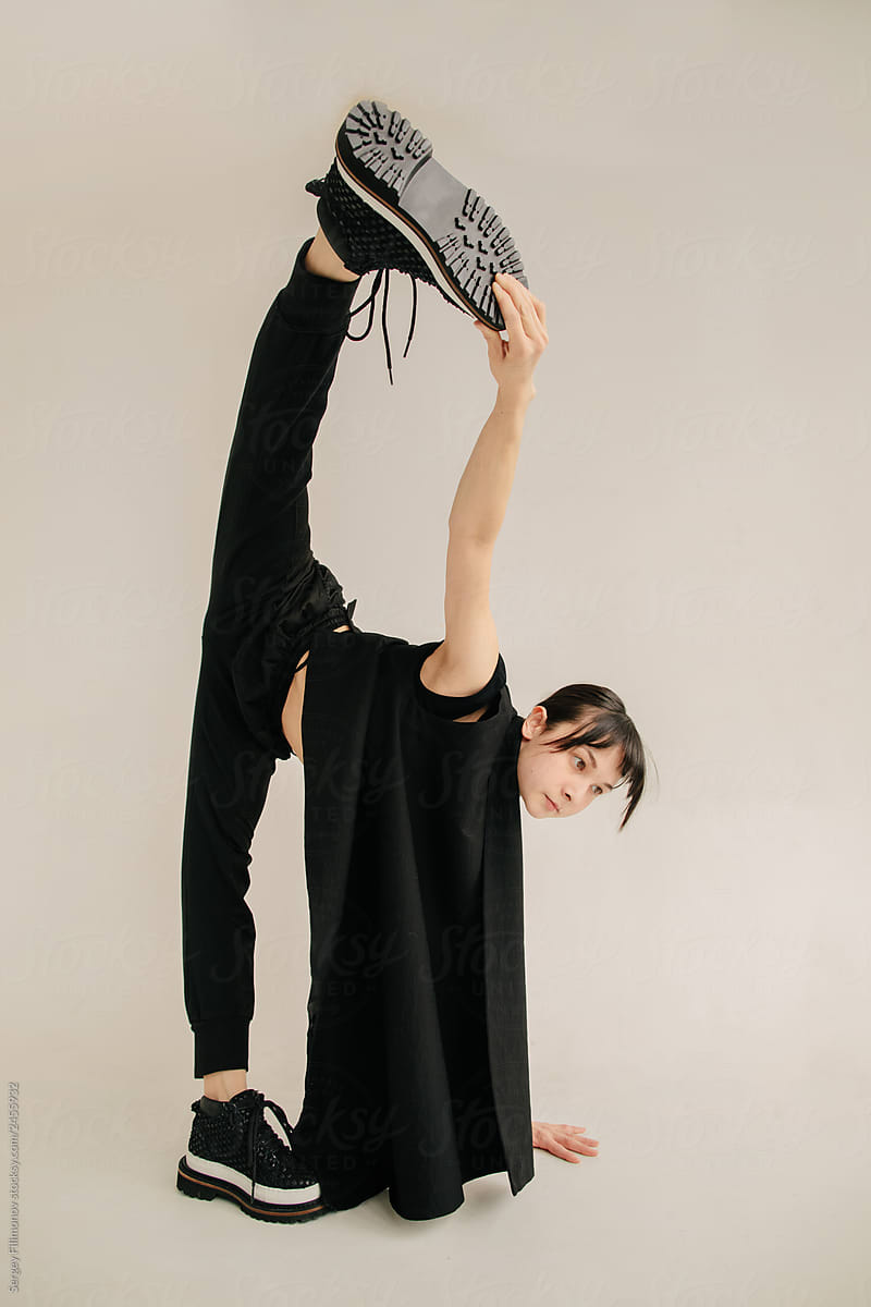 Young dancer doing vertical split